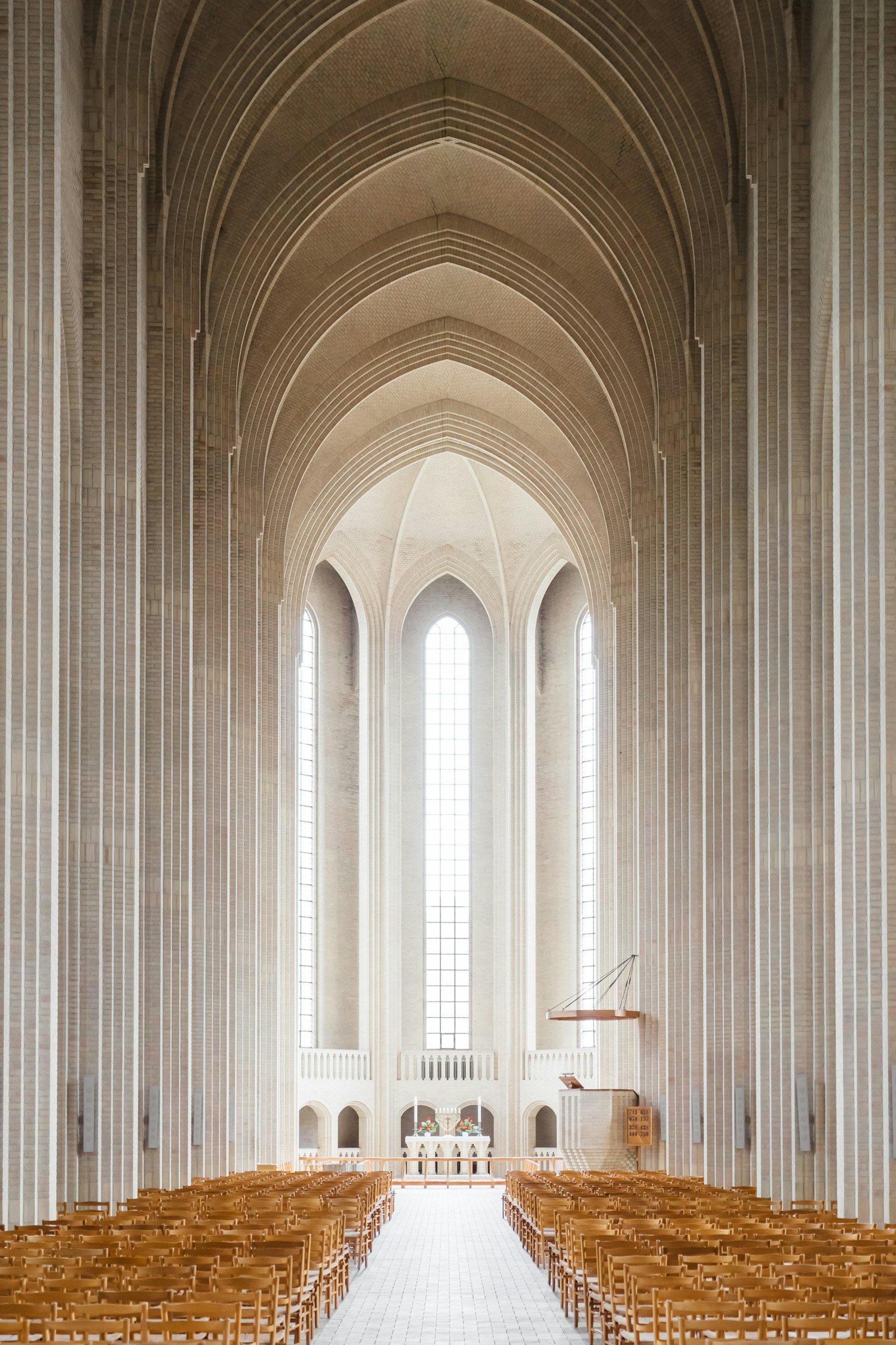 Light falling through the windows of a church interior
