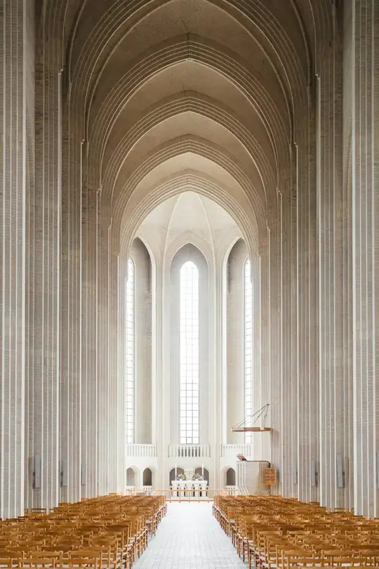 Light falling through the windows of a church interior