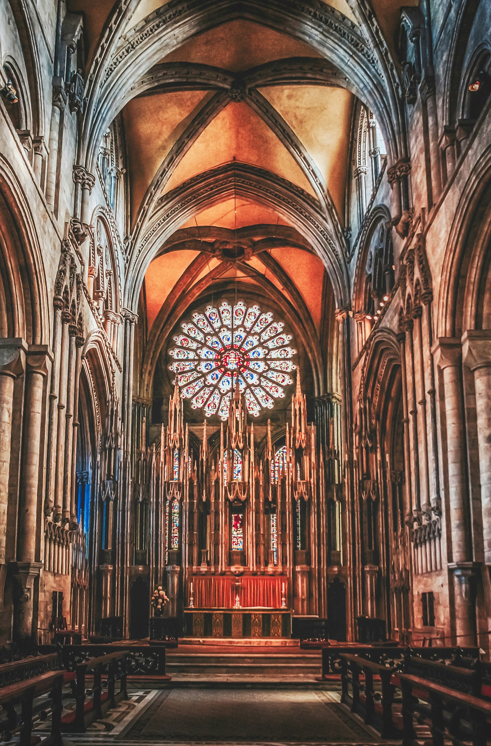 Interior of a Catholic church with stained glass windows